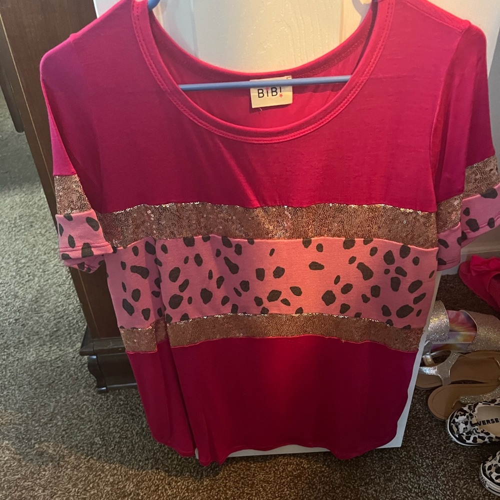 Bibi brand- fuchsia top with sequins and dots.